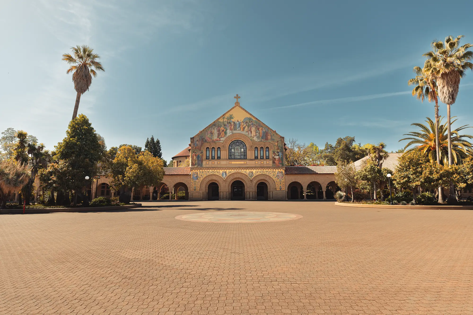 Stanford memorial church courtyard during the day with blue sky
