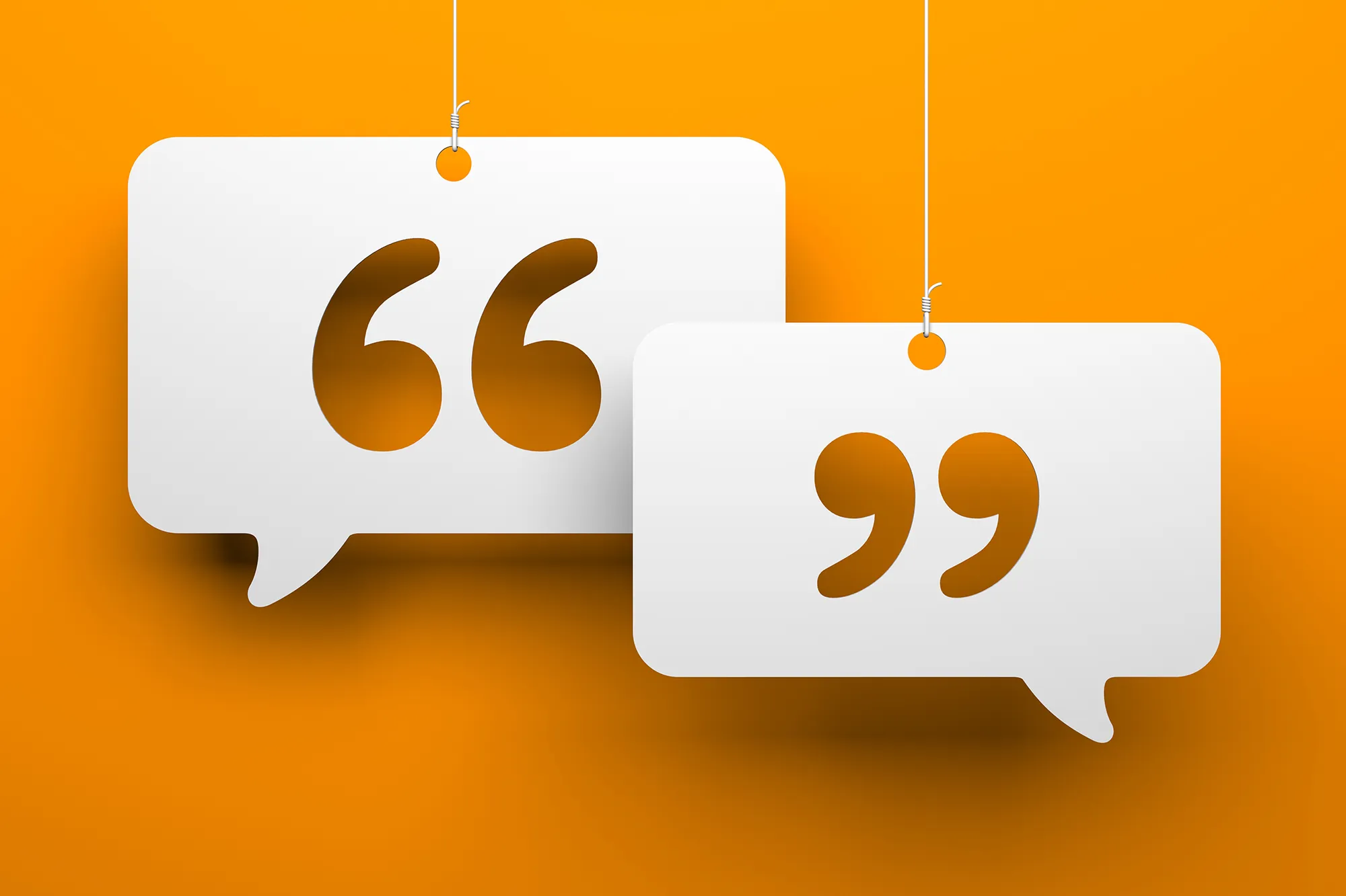 Two speech bubble icons with quotation marks hanging against a bright orange background, symbolizing dialogue, communication, and exchange of ideas.