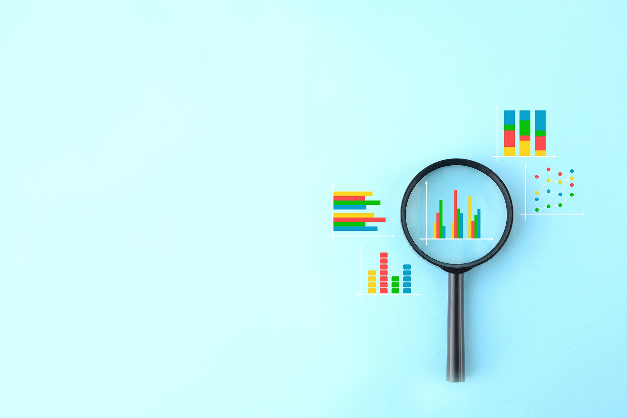 A magnifying glass centered over a bar chart, surrounded by various colorful icons of graphs and data visualizations on a light blue background, symbolizing data analysis.
